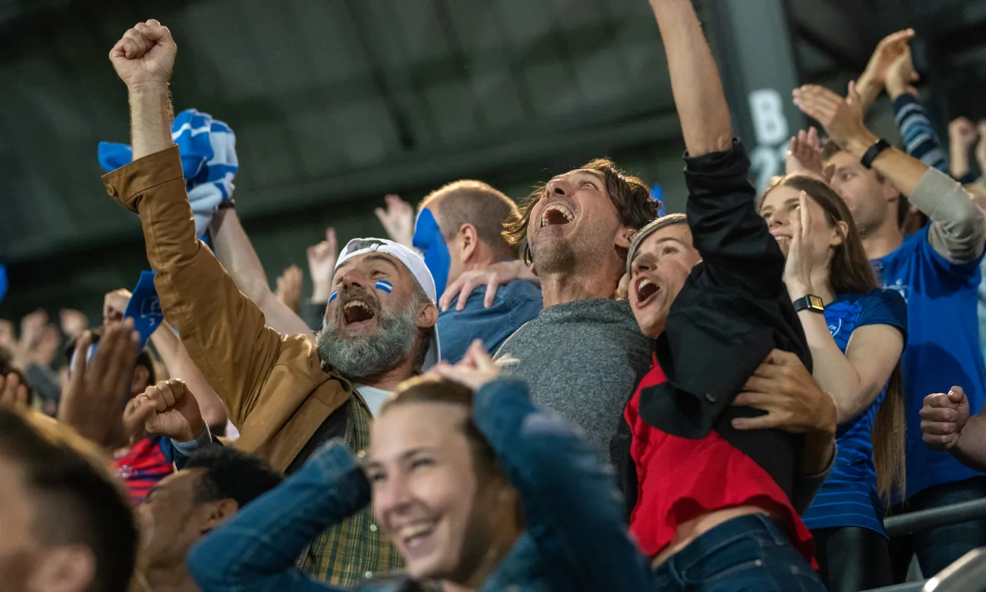 Chez certains aficionados, le sport s'apparente à une vraie religion. IStock
